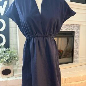 American Apparel Blue Mini Dress with Sleek Silhouette and Playful Design